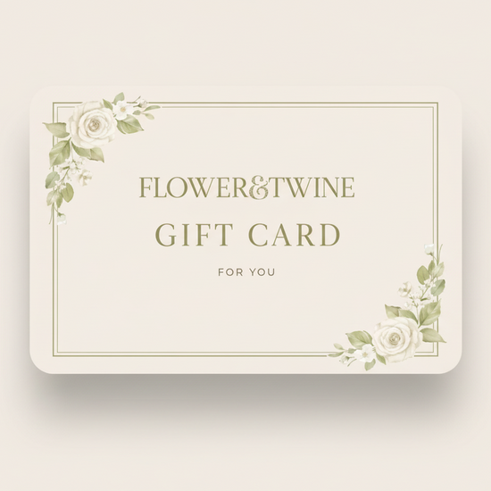 Gift card with floral design and 'Flower & Twine' branding on a beige background